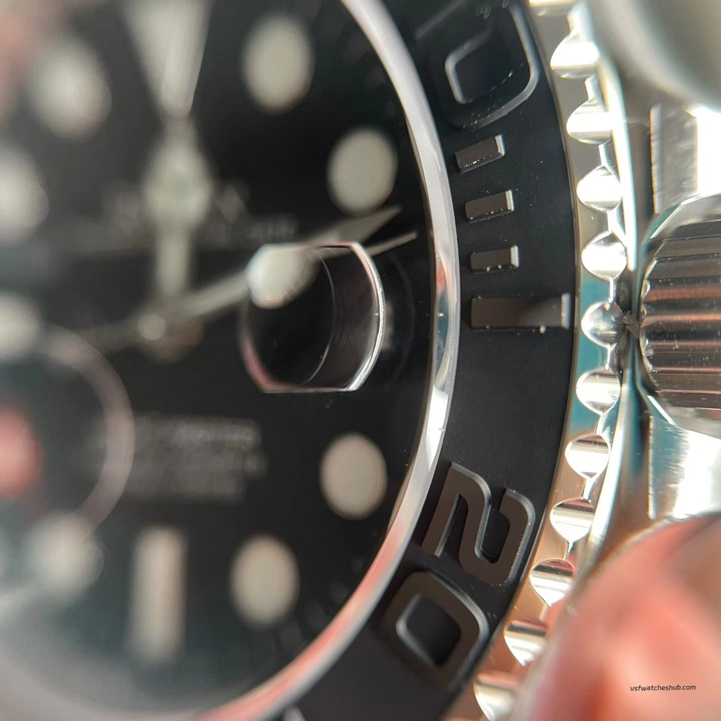 Rolex 226659 black ceramic bezel teeth and white gold crown macro