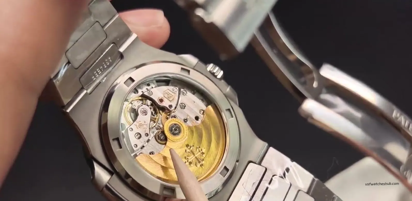 DDF 330 clone movement engraving, gold chatons and balance wheel